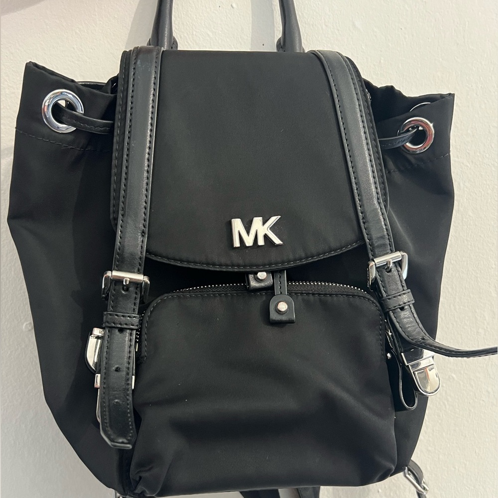 Black and Silver MK backpack.